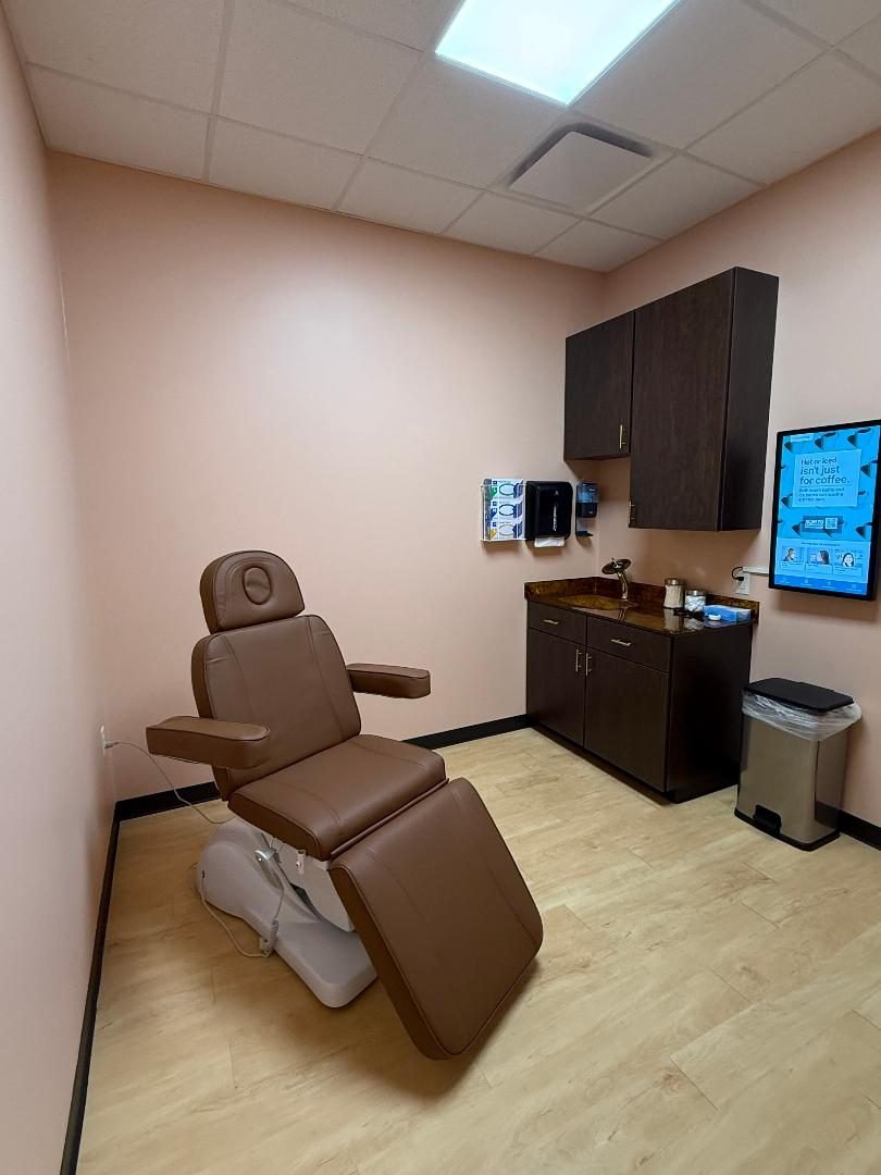 A Prime Health treatment suite with a reclining treatment chair